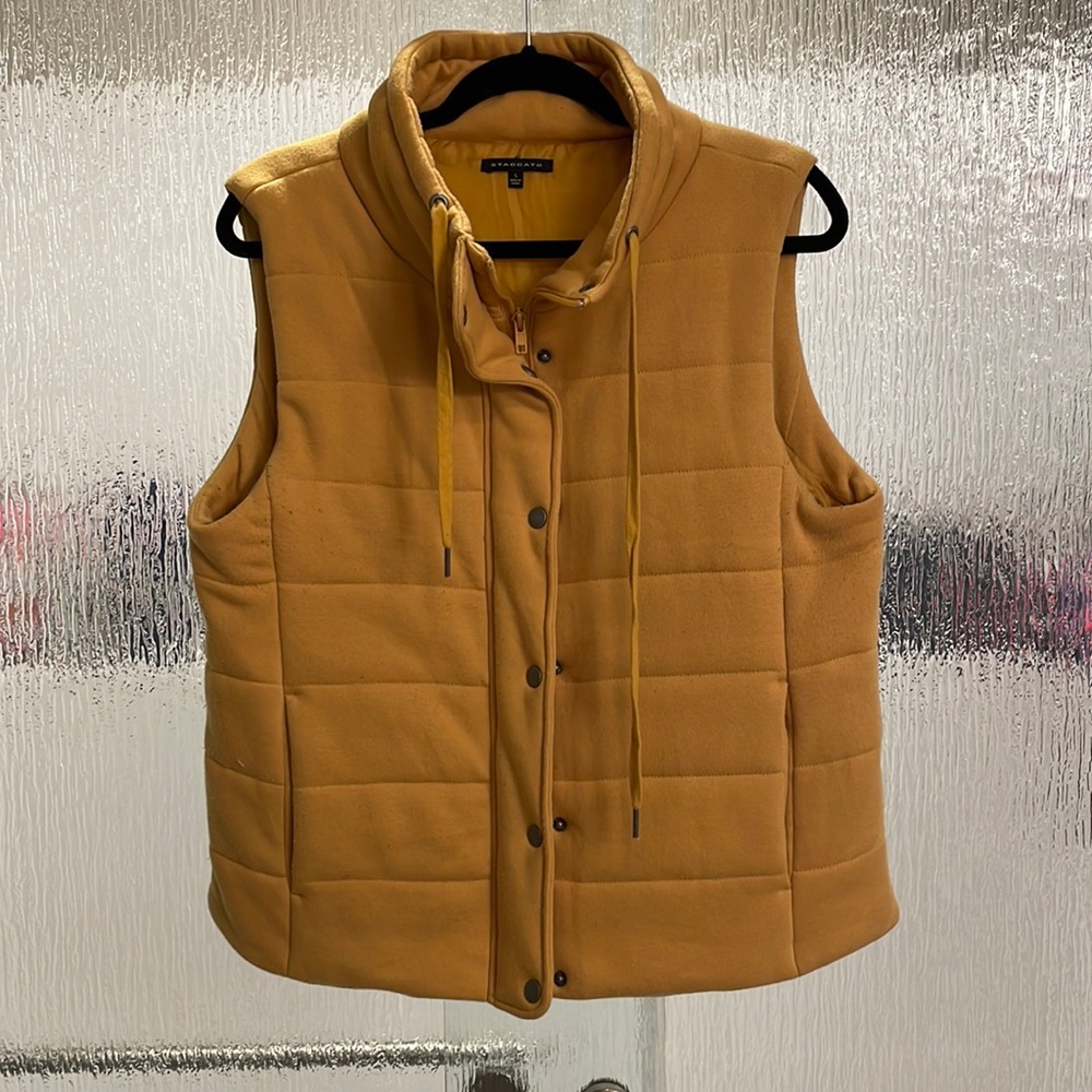 Mustard colored puffy vest. Worn 1x. Decided yellow isn’t a good color on me.